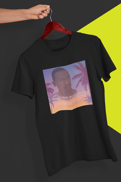 A black T-shirt with an aesthetic miami imagery and cj from GTA San Andreas in the background written &quot;Ah shit, here we go again.&quot;, held by a hand against a split black and yellow background.