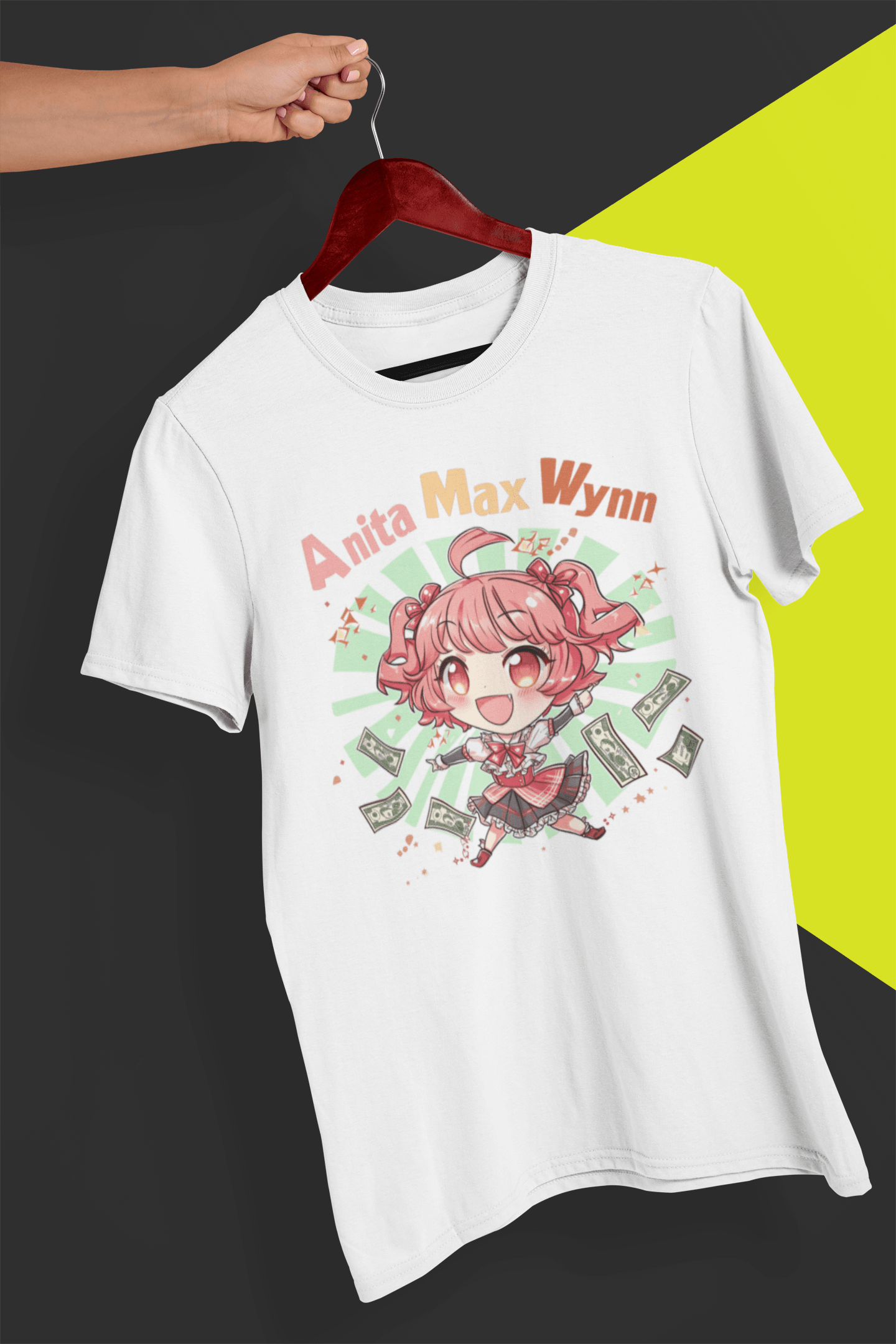 A white T-shirt with a cute chibi anime girl that says &quot;Anita Max Wynn&quot;, held by a hand against a split black and yellow background.