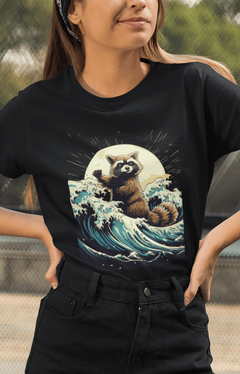 A woman wears a black T-shirt with an aesthetic racoon in the waves.