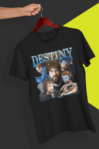 A black T-shirt with a bootleg design of Steven Destiny Bonell The Second written &quot;Destiny&quot; on top, is hung on a red hanger, held by a hand against a split black and yellow background.