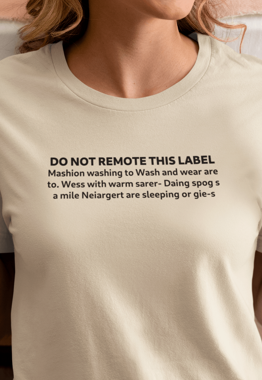 A woman wears an off-white T-shirt that says &quot;DO NOT REMOTE THIS LABEL Mashion washing to Wash and wear are to. Wess with warm sarer- Daing spog s a mile Neiargert are sleeping or gie-s&quot;.