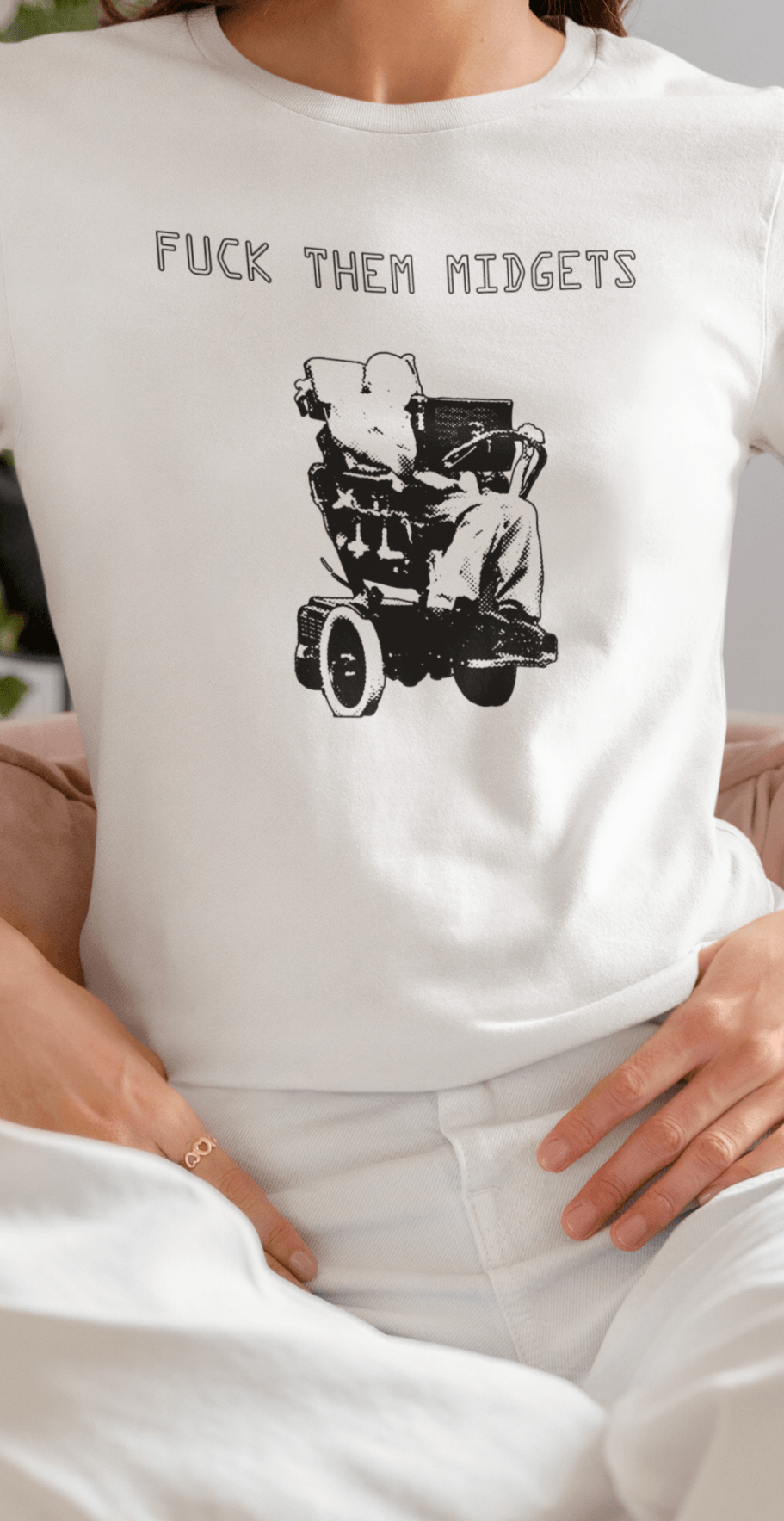 A woman wears a white T-shirt featuring Stephen Hawking on his wheelchair saying &quot;Fuck them midgets&quot;