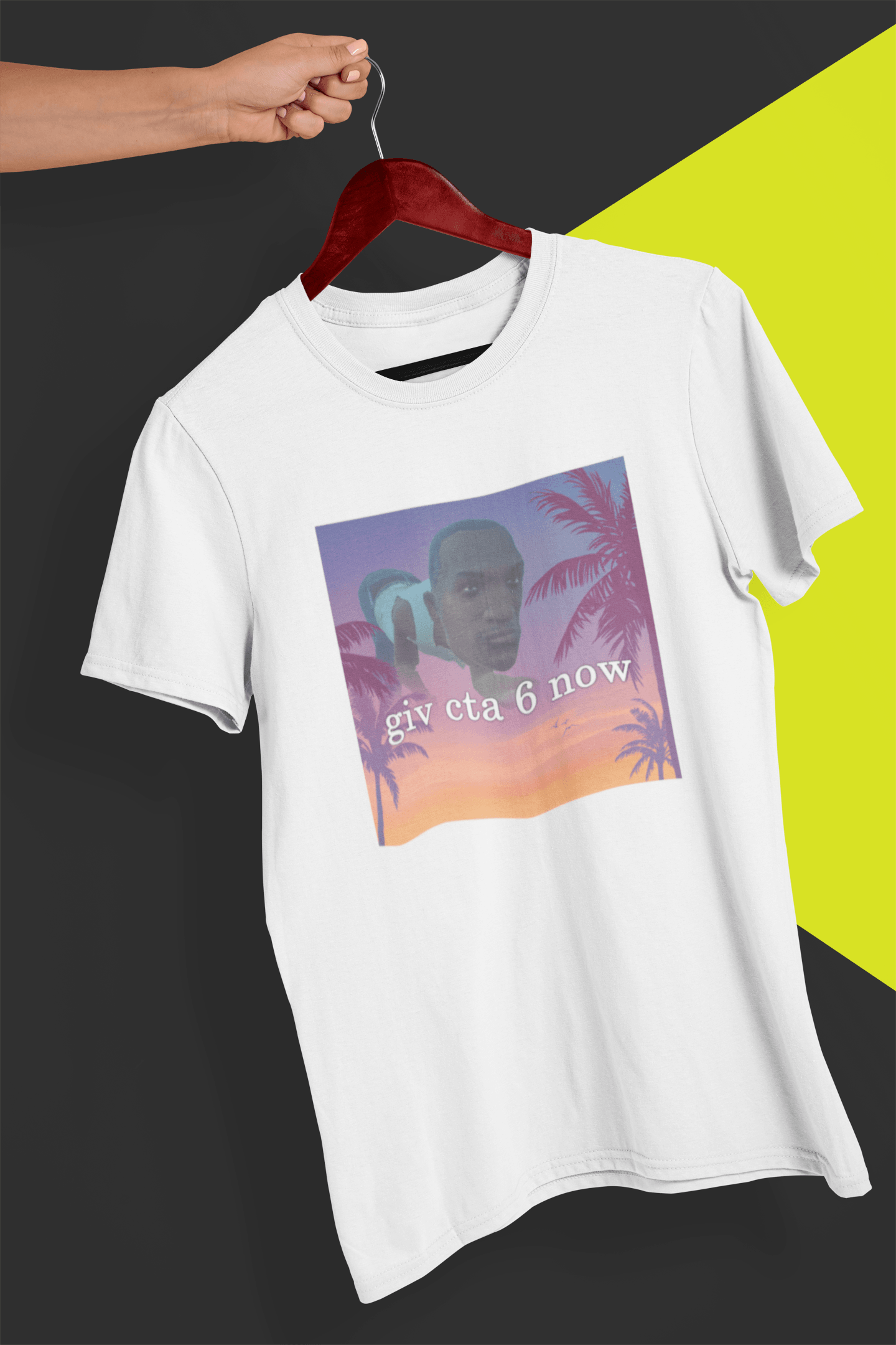 A white T-shirt with an aesthetic miami imagery and a funny depiction cj from GTA San Andreas in the background written &quot;giv cta 6 now&quot;, held by a hand against a split black and yellow background.