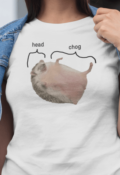 A woman wears a white T-shirt featuring a cute hedgehog, which says &quot;head&quot; pointing at his head, and &quot;chog&quot; pointing at the rest of his body