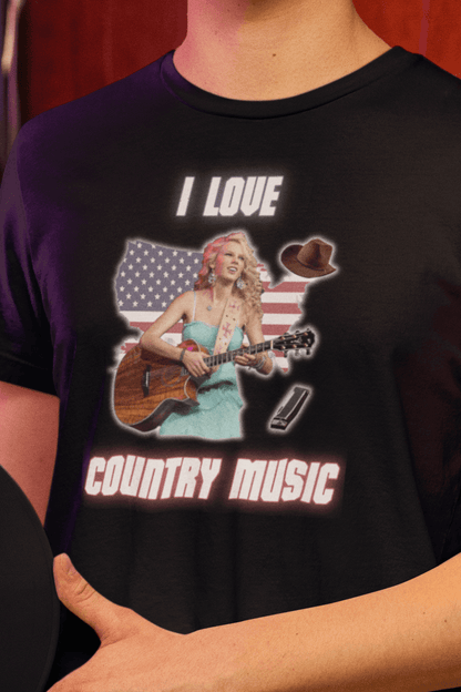 A man wears a black T-shirt featuring Taylor Swift that says &quot;I Love Country Music&quot;.