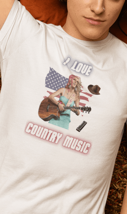 A man wears a white T-shirt featuring Taylor Swift that says &quot;I Love Country Music&quot;.