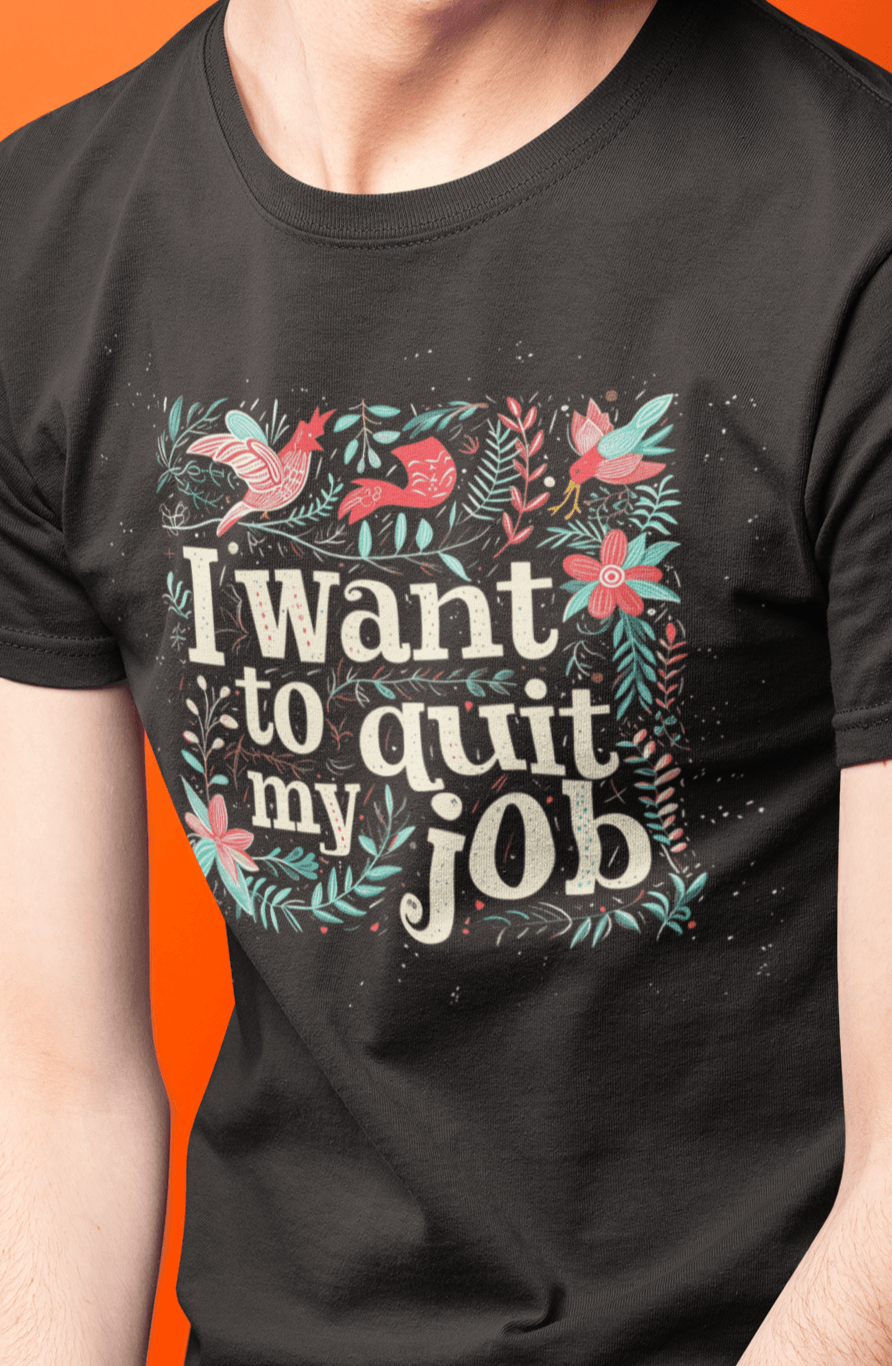 A man wears a black T-shirt featuring a typography design, saying &quot;I want to quit my job&quot;.