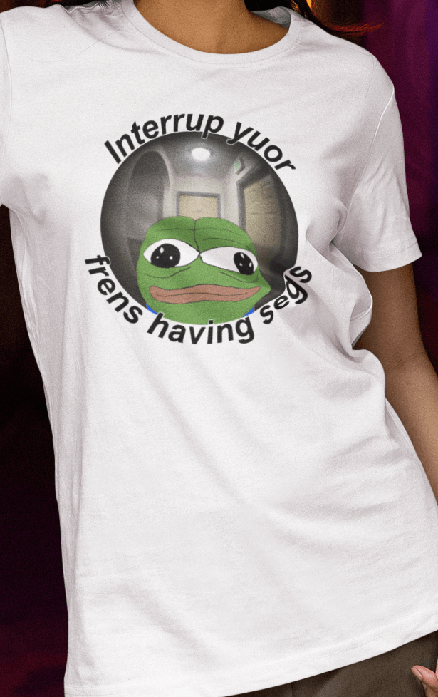 A woman wears a white T-shirt featuring a peepo frog on the other side of a door peephole, saying &quot;Interrupt your friends having sex&quot; full of typos