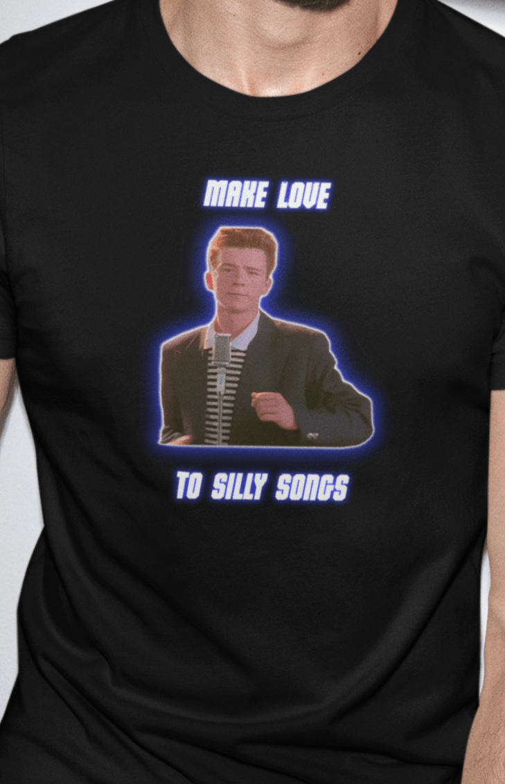 A man wears a black T-shirt with a depiction of Rick Astley that says &quot;Make Love To Silly Songs&quot;.