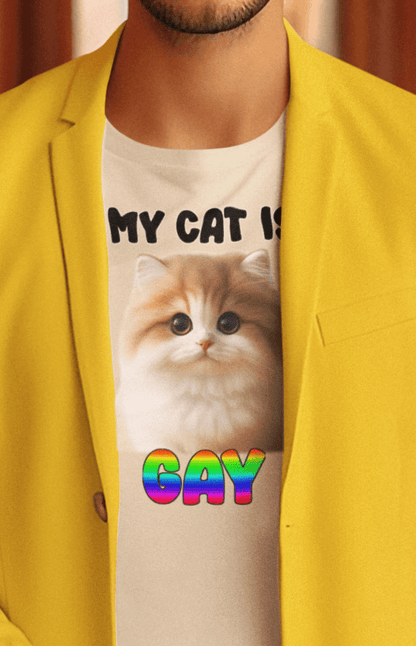 A man wears an off-white T-shirt featuring a cute cat written &quot;My Cat is Gay&quot; on top.