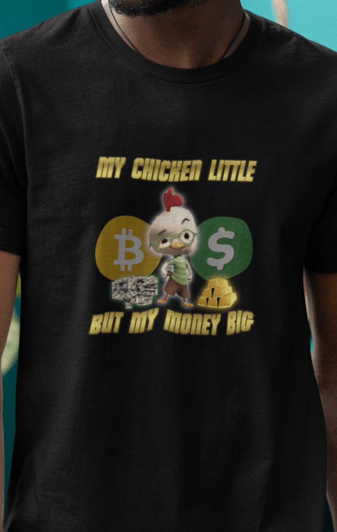 A man wears a black T-shirt featuring Chicken Little that says &quot;My Chicken Little But My Money Big&quot;.