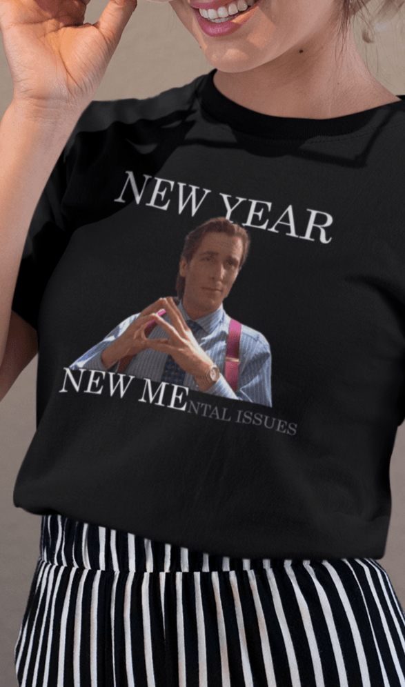 A woman wears a black T-shirt featuring Christian Bale in american psycho, saying &quot;New Year, New Mental Issues&quot;.