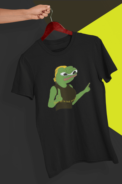 A black T-shirt with a cute apu apustaja pepe in the middle pointing and written &quot;That MF isn&#39;t real!&quot;, held by a hand against a split black and yellow background.